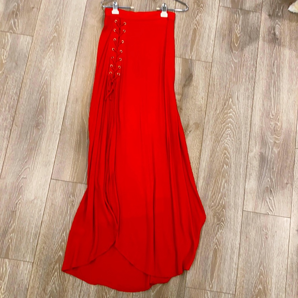 Red maxi skirt with lace up detail. Worn once.